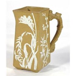 Victorian square based brown stoneware jug with applied aesthetic birds and flowers, 16cm high