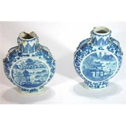 Two 19th century Chinese blue and white moon flasks decorated with pagodas, one with figures and peo