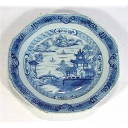 Hexagonal Chinese blue and white plate hand painted with a willow pattern, 26cm diameter