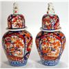 Image 1 : Pair of hand painted Japanese Imari porcelain vases and covers with Foo Dog knops, hand painted with