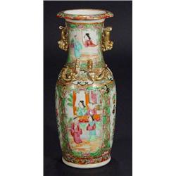 Twin handled Cantonese porcelain vase hand enamelled with panels of figures and birds amongst flower