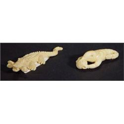 Miniature ivory crocodile and a lobster