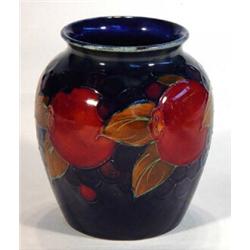 Moorcroft vase hand painted with tubelined 'Pomegranate' pattern, impressed marks to base, 10cm high