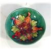 Image 1 : Moorcroft pedestal dish hand painted and tubelined with 'Colombine' pattern onto a light green groun