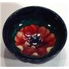 Image 1 : Small Moorcroft bowl hand painted and tubelined with an anemone onto a dark blue ground, impressed m