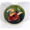 Image 1 : Moorcroft dish hand painted and tubelined with 'Orchid' pattern onto a green ground, impressed marks