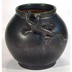 Black and green iridescent glazed Art pottery vase relief moulded with a lizard climbing the neck, i