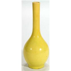 Yellow glazed slender necked pottery vase, 24cm high