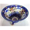 Image 1 : Carltonware three footed bowl hand painted with flowers onto a blue ground, marks to base, 26cm diam