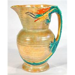 Hand painted Burleighware jug moulded with a dragon handle onto an orange and green iridescent groun