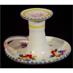 Poole pottery traditional chamberstick hand painted with a band of flowerheads, impressed marks to b