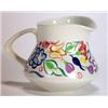 Image 1 : Poole Pottery traditional jug, hand painted with a band of flowers, marks to base, 11cm high