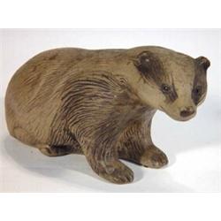 Poole pottery Barbara Lynley Adams seated badger, impressed marks to base, 21cm in length