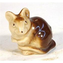 Brown glazed Poole pottery seated mouse, marks to base, 6cm high