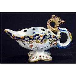 Hand painted French faience chamberstick with pierced rim and serpent handle, painted marks to base,