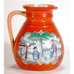 Victorian jug, transfer printed and hand coloured with oriental scenes onto an orange background, 16