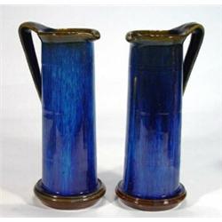 Pair of Bourne Denby Dansbyware electric blue glazed ewers, marks to base, 25cm high