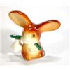 Image 1 : Hand painted Goebels seated rabbit clutching a flower, marks to base, 6cm high