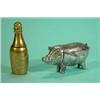 Image 1 : White metal pig shaped vesta and a brass champagne bottle vesta, largest 4cm long