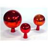 Image 1 : Three graduated red mirrored glass mercury balls, largest 25cm high