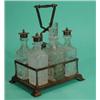 Image 1 : Victorian silver plated and cut glass six bottle cruet set and stand on bracket feet