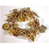 Image 1 : 9ct gold charm bracelet with approximately twenty five assorted gold charms including top hat, swan,