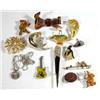 Bag of assorted costume jewellery brooches, including stylish cat, teddy bear, deco fan etc