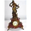 Image 1 : Victorian red marble and gilt Spelter lady design clock, the French movement with ceramic floral dia