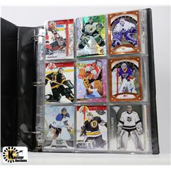 BINDER OF NHL GOALIE CARDS QUICK, ROY, BRODEUR