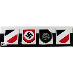 COLLECTION OF FOUR GERMAN HELMET DECALS