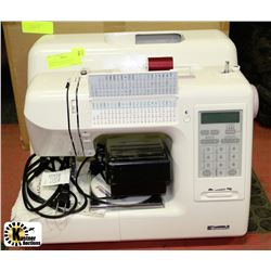 KENMORE SEWING MACHINE MODEL # 19233 WITH CASE