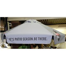 GREY & LARGE PATIO UMBRELLA WITH SMIRNOFF ICE LOGO