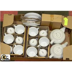 FLAT WITH 2 WHITE TEASETS,2 TEAPOTS,12 CUPS&PLATES