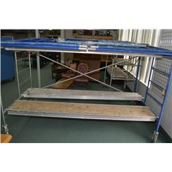 Construction grade scaffolding including seven 5'X5' frames, four 10' decks, four wheels and five cr