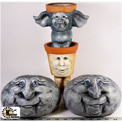 BOX WITH ASSORTED GARDEN DECOR INCL. 2 STONE FACES