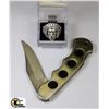 Image 1 : FLAT WITH INDIANHEAD RING AND POCKETKNIFE
