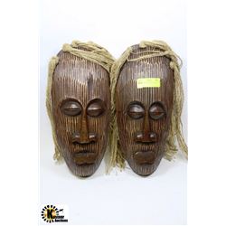 PAIR OF HAND CARVED WOODEN MASKS