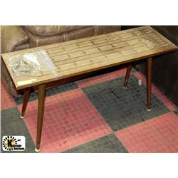 LARGE WOODEN CRIB TABLE WITH BULLET CASINGS FOR