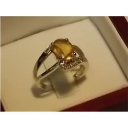 RING - DEEP ORANGE/YELLOW OVAL FACETTED CITRINE IN STERLING SILVER SETTING - HAS 2 GENUINE DIAMONDS 