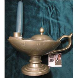 Pewter "Alladin's Lamp" Style Candle holder with candle. Hole in base. 'Doc' valued it at $150.00.