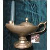 Image 1 : Pewter "Alladin's Lamp" Style Candle holder with candle. Hole in base. 'Doc' valued it at $150.00.