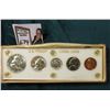 Image 1 : 1956 U.S. Proof Set. Cent to Half-Dollar in a white Capital holder with gold lettering and box. Five