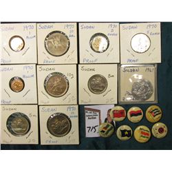 (10) Sudan Coins, which 'Doc' had valued at over $20.00; & (7) Foreign flag depicting Advertsing Pin