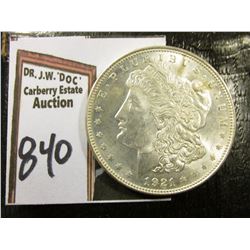 1921 P Morgan Silver Dollar. Brilliant Uncirculated. Small toning area on reverse.