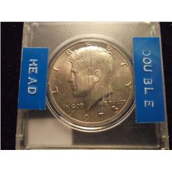 1973 DOUBLE HEADED KENNEDY HALF NOVELTY COIN MARKS ARE ON THE CASE