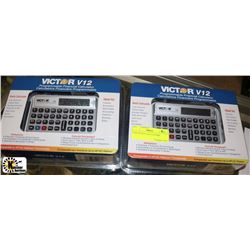 PAIR OF NEW CALCULATORS