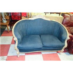 DENIM LOVESEAT WITH WOODEN CARVED TRIM