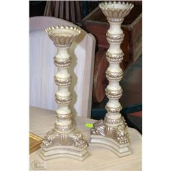 PAIR OF SILVER AND BEIGE CANDLE HOLDERS