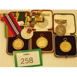 Three boxed competition medals, stamped on bo…