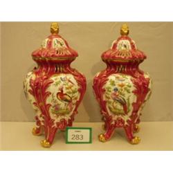Pair of Chelsea style vases with lids, bear g…